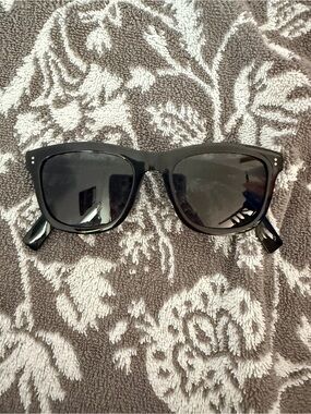 Burberry folding sunglasses.